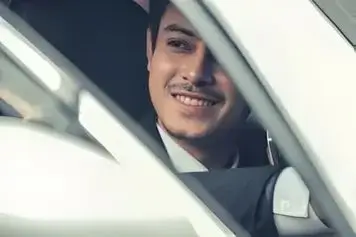 Asian Chauffeur smiling